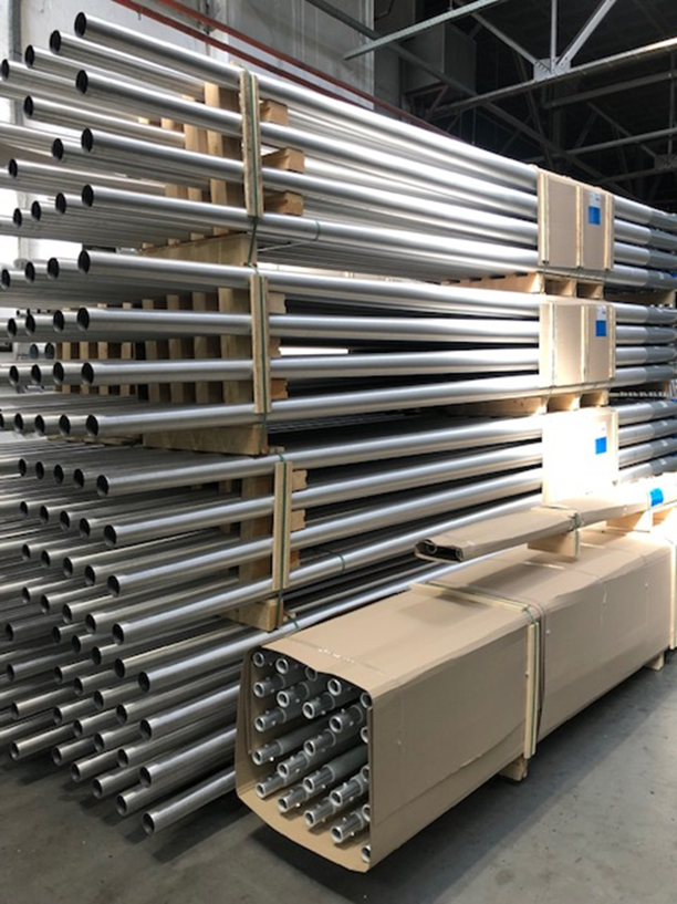 Aluminium poles stacked ready for despatch